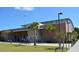 Exterior view of a community center with brick facade and palm trees at 134 Vistawood Dr, Charleston, SC 29414