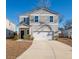 Two-story house with a two-car garage at 134 Vistawood Dr, Charleston, SC 29414