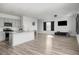 Open living room with hardwood floors and barn door style windows at 134 Vistawood Dr, Charleston, SC 29414