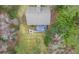 Aerial view showcasing a home's deck and backyard patio at 1575 Tacky Point Rd, Wadmalaw Island, SC 29487