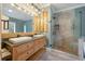 Spa-like bathroom with dual vanities, a large shower, and a modern design at 1575 Tacky Point Rd, Wadmalaw Island, SC 29487