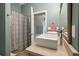 Updated bathroom with double sinks and a shower at 1575 Tacky Point Rd, Wadmalaw Island, SC 29487