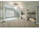 Cozy bedroom with built in closets and window at 1575 Tacky Point Rd, Wadmalaw Island, SC 29487