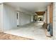 Covered patio with concrete flooring and exterior access at 1575 Tacky Point Rd, Wadmalaw Island, SC 29487