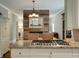 Modern kitchen with stainless steel appliances and a breakfast bar at 1575 Tacky Point Rd, Wadmalaw Island, SC 29487