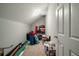 Spacious attic storage room with sloped ceilings at 1575 Tacky Point Rd, Wadmalaw Island, SC 29487