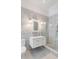 Elegant bathroom with marble tile, floating vanity, and walk-in shower at 1750 Ion Ave, Sullivans Island, SC 29482