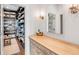 Walk-in closet with ample shelving and hanging space at 1750 Ion Ave, Sullivans Island, SC 29482