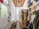 Bright entryway with built-in shelving and coat rack at 1750 Ion Ave, Sullivans Island, SC 29482