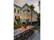 Elegant home with a large porch and well-manicured lawn at 1750 Ion Ave, Sullivans Island, SC 29482