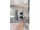 Stainless steel appliances and brick floors in this modern kitchen at 1750 Ion Ave, Sullivans Island, SC 29482