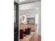 Modern kitchen with brick flooring, an island, and a mix of traditional and contemporary finishes at 1750 Ion Ave, Sullivans Island, SC 29482
