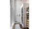 Laundry room with stacked washer and dryer, plus shelving at 1750 Ion Ave, Sullivans Island, SC 29482