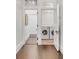 Convenient laundry room with washer and dryer, located near hallway at 1750 Ion Ave, Sullivans Island, SC 29482