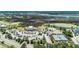 Aerial view of community with pools, tennis courts, and clubhouse at 1800 Palmetto Isle Dr, Mount Pleasant, SC 29466