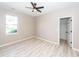 Simple bedroom with large closet and a window at 1800 Palmetto Isle Dr, Mount Pleasant, SC 29466