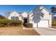 One-story home with attached garage and manicured lawn at 1800 Palmetto Isle Dr, Mount Pleasant, SC 29466