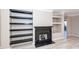Modern fireplace with built-in shelving at 1800 Palmetto Isle Dr, Mount Pleasant, SC 29466