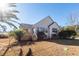 House exterior with wooden deck and landscaping at 1800 Palmetto Isle Dr, Mount Pleasant, SC 29466