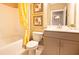 Bright bathroom with yellow accents and a shower/tub combo at 211 Bilge Rd, Ridgeville, SC 29472