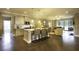Open kitchen with granite island and stainless steel appliances at 211 Bilge Rd, Ridgeville, SC 29472