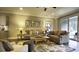 Spacious living room with fireplace and access to screened porch at 211 Bilge Rd, Ridgeville, SC 29472