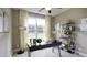 Bright home office with large window, built-in shelving, and workspace at 211 Bilge Rd, Ridgeville, SC 29472