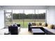 Relaxing screened porch with wooded views and comfortable seating at 211 Bilge Rd, Ridgeville, SC 29472