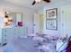 Bedroom with dresser and floral bedding at 213 Bilge Rd, Ridgeville, SC 29472
