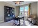 Home office with built-in shelving and large window at 213 Bilge Rd, Ridgeville, SC 29472
