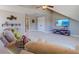 Home theater in the attic with sectional and TV at 213 Bilge Rd, Ridgeville, SC 29472