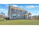 This home features a big yard and screened in porch at rear of home at 213 Bilge Rd, Ridgeville, SC 29472