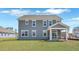 This home features a big yard and screened in porch at rear of home at 213 Bilge Rd, Ridgeville, SC 29472