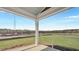 The screened porch features an open view to a big backyard at 213 Bilge Rd, Ridgeville, SC 29472