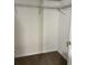 A spacious closet offers ample storage with shelving and neutral carpet at 214 Hardee Ave Ave, Summerville, SC 29485