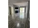 Open living room with modern floors, fireplace, and lots of natural light at 214 Hardee Ave Ave, Summerville, SC 29485