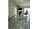 Spacious living room featuring gray vinyl plank flooring and a fireplace at 214 Hardee Ave Ave, Summerville, SC 29485