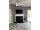 Cozy living room featuring a fireplace and access to the outdoors at 214 Hardee Ave Ave, Summerville, SC 29485