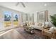 Living area with French doors opening to a patio and backyard view at 233 Abercom Place Dr, Moncks Corner, SC 29461