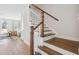 Elegant staircase leading to upper level at 233 Abercom Place Dr, Moncks Corner, SC 29461