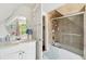 Clean bathroom with shower/tub combo and updated vanity at 27 Chapel St, Charleston, SC 29403