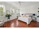Spacious bedroom with king-size bed and hardwood floors at 27 Chapel St, Charleston, SC 29403