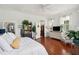 Large bedroom with a king-size bed and hardwood floors at 27 Chapel St, Charleston, SC 29403