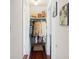 Functional attic closet with coats and shelves at 27 Chapel St, Charleston, SC 29403