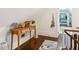 Upper hallway with hardwood floors and access to bedrooms at 27 Chapel St, Charleston, SC 29403