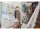 Convenient laundry room with washer, dryer, and storage at 27 Chapel St, Charleston, SC 29403