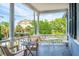 Relaxing porch with wicker furniture and a view of the street at 27 Chapel St, Charleston, SC 29403