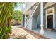 Brick pathway leads to the side entrance of this charming home at 27 Chapel St, Charleston, SC 29403