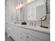 Double vanity bathroom with quartz countertops and brushed gold fixtures at 274 Tupelo Lake Dr, Summerville, SC 29486
