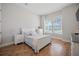 Bright bedroom with wood floors and white furniture at 274 Tupelo Lake Dr, Summerville, SC 29486